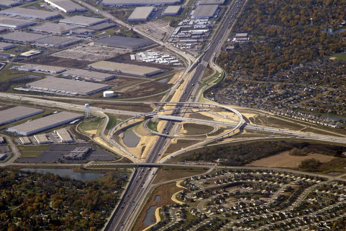 Aerial view of distribution warehouses at the I-55 and I-355 interchange in Bolingbrook — security guards Bolingbrook and Romeoville IL